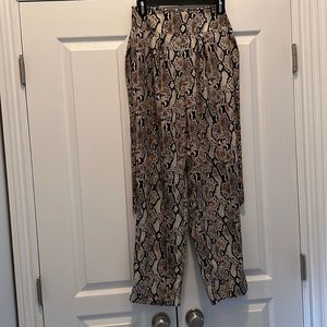 Snakeskin light weight rayon pants. So comfy!! Great fit!